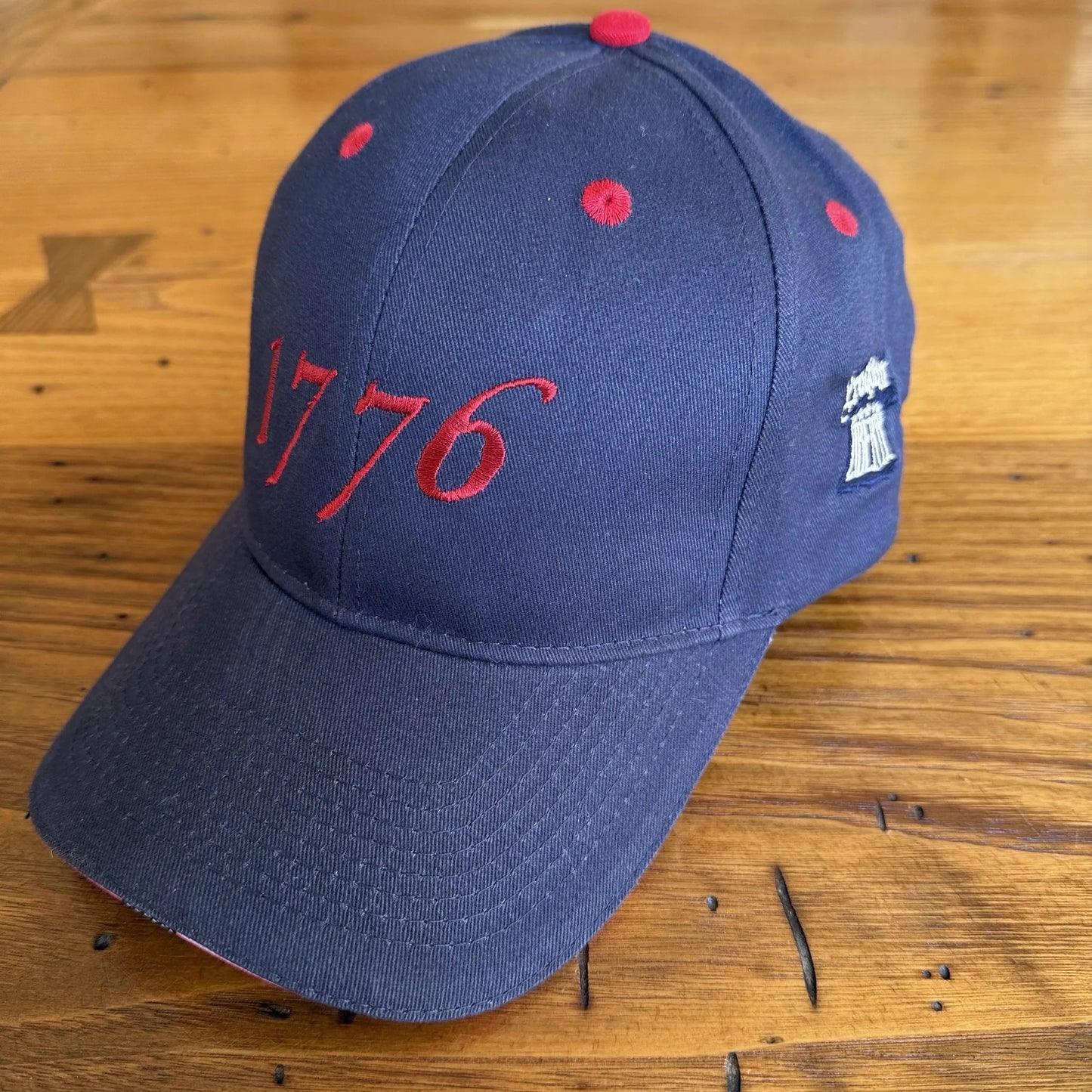 "1776" cap featuring Proclaim Liberty and flag brim