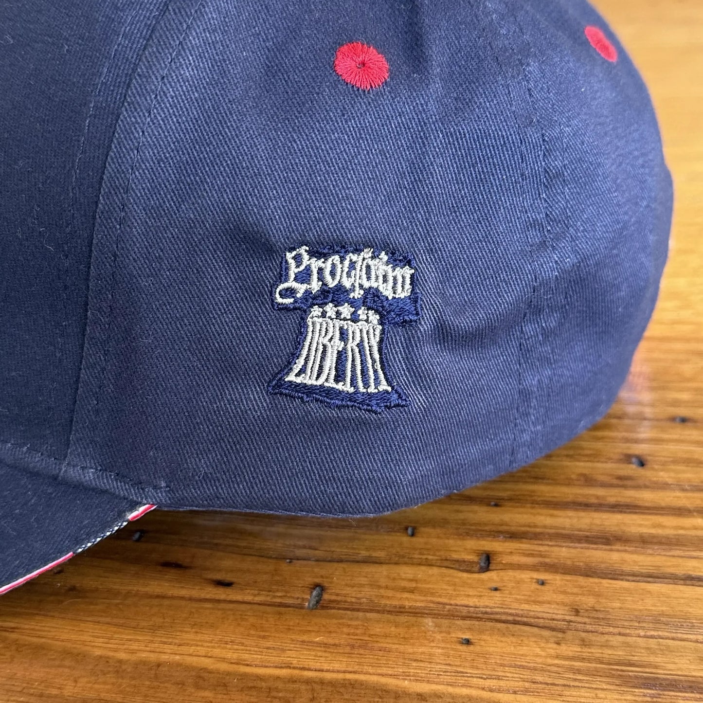 "1776" cap featuring Proclaim Liberty and flag brim