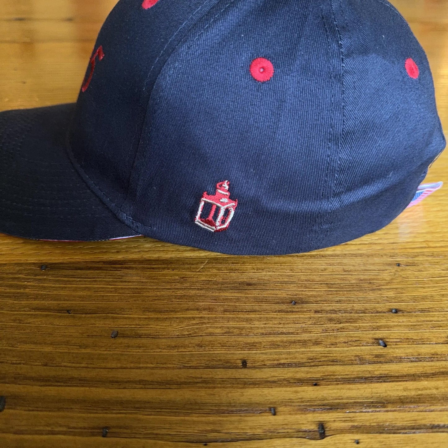 "1775" cap featuring Proclaim Liberty and flag brim