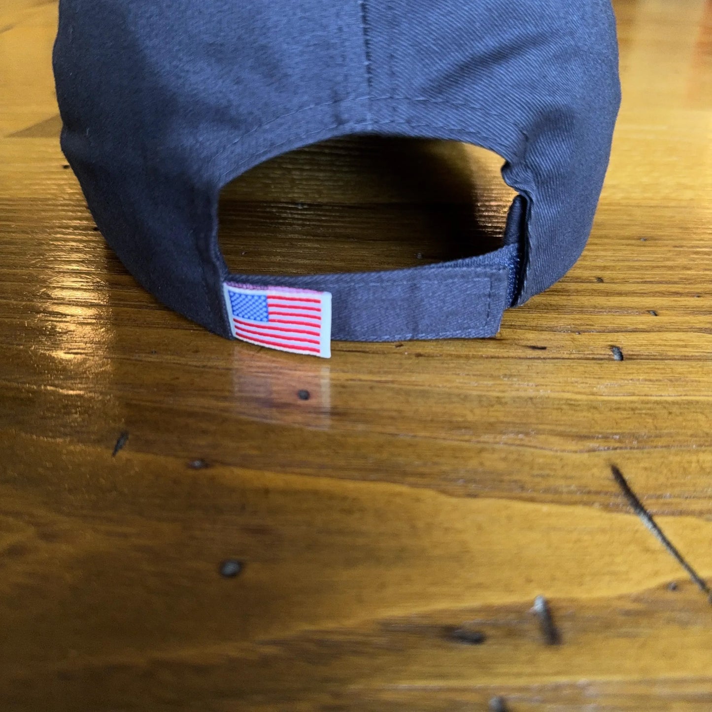 "1775" cap featuring Proclaim Liberty and flag brim